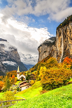 Alpine village of Lauterbrunnen and Trummelbach Falls cascade in autumn, canton of Bern, Bernese Oberland, Switzerland, Europe