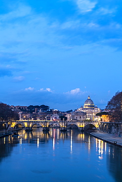 River Tiber with Umberto I Bridge and St. Peter's Basilica (Basilica di San Pietro) in background at dusk, Rome, Lazio, Italy, Europe