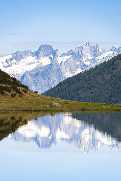 Piz Badile and Cengalo reflected in Porcile Lakes, Val Lunga, Tartano Valley, Valtellina, Sondrio province, Lombardy, Italy, Europe