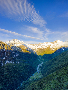 Aerial panoramic of Monte Disgrazia and Chiareggio valley at dawn, Valmalenco, Sondrio province, Valtellina, Lombardy, Italy, Europe