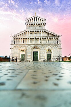 Romanesque facade of Pisa Cathedral (Duomo) under romantic sky at sunrise, Piazza dei Miracoli, UNESCO World Heritage Site, Pisa, Tuscany, Italy, Europe