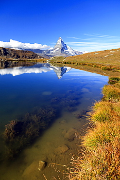 The Matterhorn reflected in Stellisee, Zermatt, Canton of Valais, Pennine Alps, Swiss Alps, Switzerland, Europe