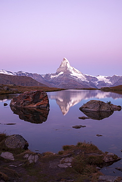 The Matterhorn reflected in the Stellisee at dusk, Zermatt, Canton of Valais, Pennine Alps, Swiss Alps, Switzerland, Europe