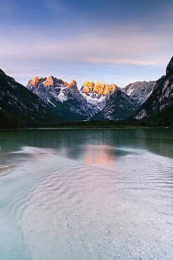 Lake Landro (Durrensee) at dawn with Popena group and Cristallo on background, Dolomites, Bolzano province, South Tyrol, Italy, Europe