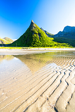 Hatten Mountain reflected in the crystal sea, Ersfjord, Senja, Troms county, Norway, Scandinavia, Europe