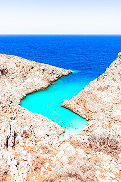 Beach of Seitan Limania washed by turquoise sea nestled inside rock canyons, Akrotiri peninsula, Chania, Crete, Greek Islands, Greece, Europe