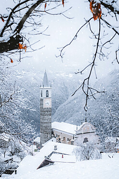 Fairy tale village and bell tower after a winter snowfall, Sacco, Val Gerola, Valtellina, Sondrio province, Lombardy, Italy, Europe