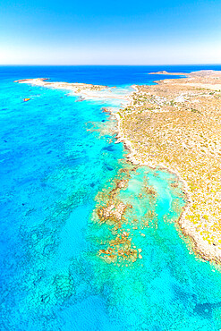 Aerial view of crystal transparent sea washing the sand beach of Elafonisi, Crete island, Greek Islands, Greece, Europe