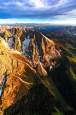 Aerial view of Sassopiatto group and Cinque Dita sharp mountains at sunset, Dolomites, South Tyrol, Italy, Europe