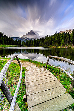 Dramatic sky with clouds over Tre Cime di Lavaredo, view from lake Antorno at dawn, Dolomites, Misurina, Veneto, Italy, Europe