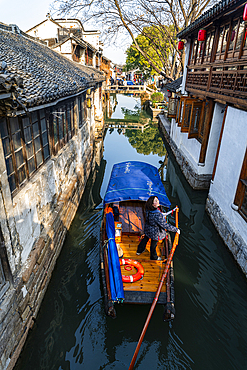 Little boat on a channel in Zhouzhuang water town, Jiangsu, China, Asia