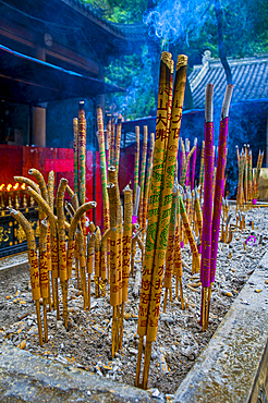 Incense sticks at a monastery on top of the largest Buddha on earth, Leshan, Sichuan, China, Asia