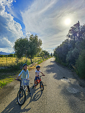 Kids cycling, Mallorca, Balearic islands, Spain, Mediterranean, Europe