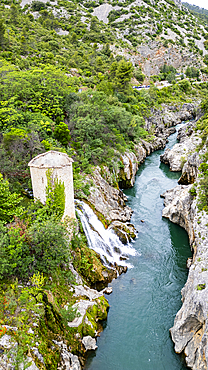 Aerial of an old watchtower in the Herault gorge, UNESCO World Heritage Site, Causses and Cevennes, Herault, Occitanie, France, Europe