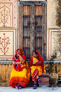 Colourful dressed women, Amer Fort or Amber Fort, Rajasthan, India