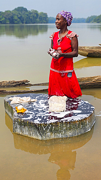 Woman handcleaning in the Sangha River, Unesco site Dzanga Sangha National Park, Central African Republic