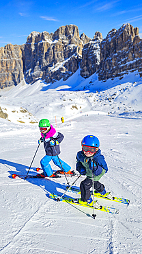 Kids skiing, Lagazuoi mountain, Unesco site Dolomites, Italy