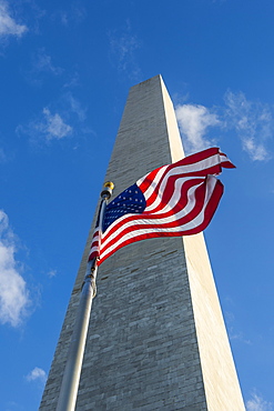 American flag in front of the Obelisk of the Washington Monument at the Mall,  Washington, District of Columbia, United States of America, North America