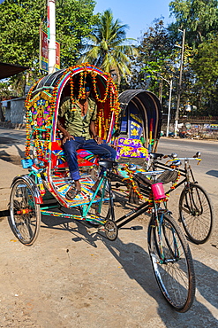 Man in his Rickshaw, Chittagong, Bangladesh, Asia