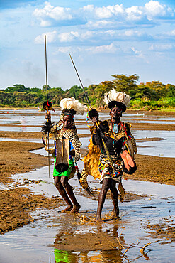 Men from the Toposa tribe posing in their traditional warrior costume, Eastern Equatoria, South Sudan, Africa