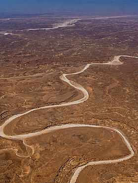 Aerial of dry canyons in the south of Rub al Khali, Salalah, Oman, Middle East