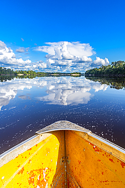 Clouds reflecting in the Rio Negro, southern Venezuela, South America