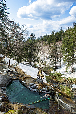 Outdoor onsen in the Daisetsuzan National Park, UNESCO World Heritage Site, Hokkaido, Japan, Asia