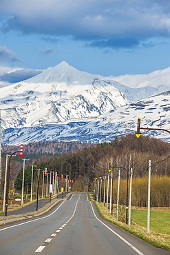 Road leading to the spectacular mountains of the Daisetsuzan National Park, UNESCO World Heritage Site, Hokkaido, Japan, Asia