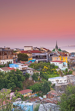 Sunset over the colourful buildings of Valparaiso, Chile, South America