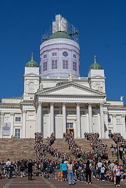 View of university students celebrating their graduation outside Helsinki Cathedral in central Helsinki,Finland,Europe