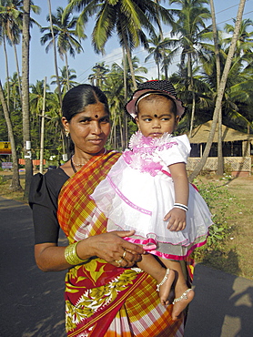 India. Local woman and baby in rural goa.