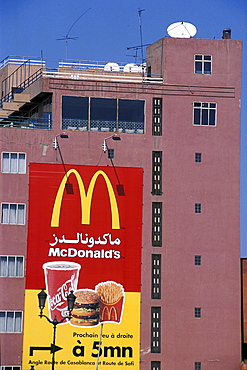 Consumerism, morocco. Marrakesh. Macdonalds and tv / satellite dishes