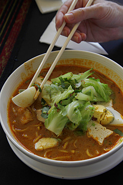 Traditional Laksa stew in a restaurant in Kuching, Borneo, Malaysia, Southeast Asia, Asia