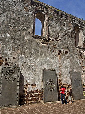 Tourists visit St. Paul's Hill with ruins of historical Portuguese fortress in Melaka (Malacca), UNESCO World Heritage Site, Malaysia, Southeast Asia, Asia