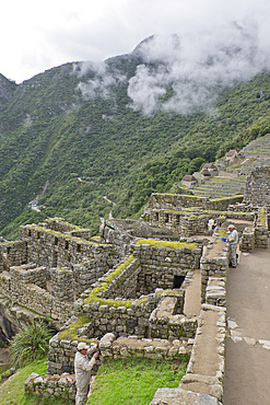 Restoration work at the Inca ruins of Machu Picchu, UNESCO World Heritage Site, Peru, South America