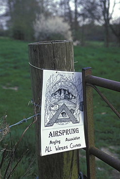 Water pollution, uk somerset. Warning signs for polluted water on the frome river