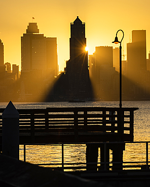 Seattle skyline at sunrise, as seen from Alki Beach, Seattle, Washington State, United States of America, North America