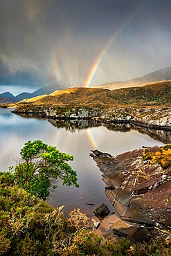 Rainbow and rain clouds over Upper Lake, Killarney National Park, County Kerry, Munster, Republic of Ireland, Europe