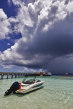 The tumultuous clouds of a tropical thunderstorm gather over the waters off Havodda Island, Gaafu Dhaalu atoll, in the far south of the Maldives, in the Indian Ocean.