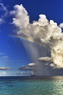 The tumultuous clouds of a tropical thunderstorm gather over the waters off Havodda Island, Gaafu Dhaalu atoll, in the far south of the Maldives, in the Indian Ocean.
