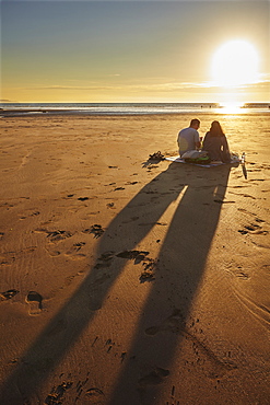 A sunset picnic on the beach, Westward Ho!, north Devon, England, United Kingdom, Europe