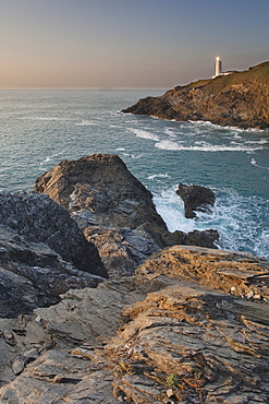 A peaceful dusk on Cornwall's Atlantic coast, showing the lighthouse at Trevose Head, near Padstow, Cornwall, England, United Kingdom, Europe