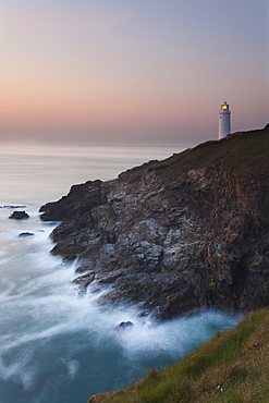 A peaceful dusk on Cornwall's Atlantic coast, showing the lighthouse at Trevose Head, near Padstow, Cornwall, England, United Kingdom, Europe