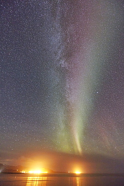 The Aurora Borealis (Northern Lights) seen over Olafsvik and Rif, on the right, Snaefellsnes peninsula, western Iceland, Polar Regions