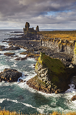 Morning sunlight on the rocks of Londranger, Snaefellsjokull National Park, close to the western tip of the Snaefellsnes peninsula, west coast of Iceland, Polar Regions