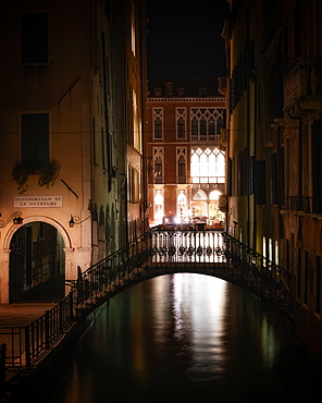 Bridge over canal at night in Venice, Italy, Europe