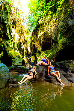 Women posing for a picture at the Beji Guwang Hidden Canyon, Bali, Indonesia, Southeast Asia, Asia