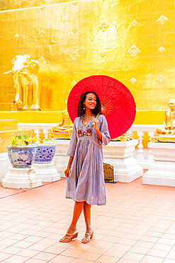 Woman at Wat Phra Singh Woramahawihan, Chiang Mai, Thailand, Southeast Asia, Asia