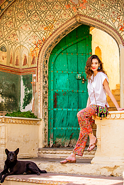 Woman with dog in Jaipur, Rajasthan, India, Asia