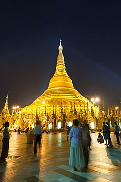 Devotees come to pray at Shwedagon Pagoda, Yangon (Rangoon), Myanmar (Burma), Asia